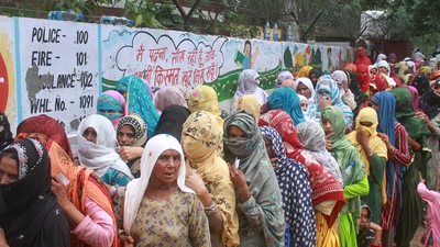Gurugram: Voters stand in queues to cast their vote during Haryana Municipal elections, at Sohna, in Gurugram, Sunday, June 19, 2022. (PTI Photo) (PTI) Gurugram: Voters stand in queues to cast their vote during Haryana Municipal elections, at Sohna, in Gurugram, Sunday, June 19, 2022. (PTI Photo) (PTI)