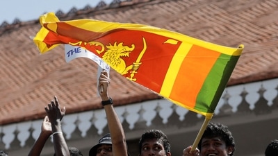 A man waves a Sri Lankan flag in Colombo. (File image) (REUTERS)