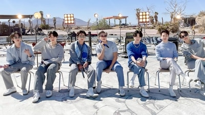 BTS members Jin, Jungkook, V, RM, Suga, Jimin, and J-Hope performed Proof Live.