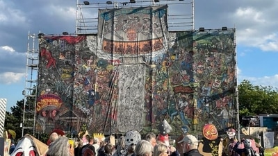 A large mural banner at Documenta has been deemed to contain antisemitic images (Sabine Oelze/DW ) A large mural banner at Documenta has been deemed to contain antisemitic images (Sabine Oelze/DW )