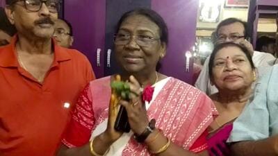 BJP’s presidential candidate Droupadi Murmu, greets well wishers who called on her at Raigangpur in Odisha, on Wednesday. (AP) BJP’s presidential candidate Droupadi Murmu, greets well wishers who called on her at Raigangpur in Odisha, on Wednesday. (AP)