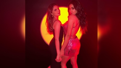Khushi Kapoor donned a black strappy slip dress paired with hoop earrings. The Kapoor sisters struck a stunning pose for the camera. (Instagram/@janhvikapoor) Khushi Kapoor donned a black strappy slip dress paired with hoop earrings. The Kapoor sisters struck a stunning pose for the camera. (Instagram/@janhvikapoor)