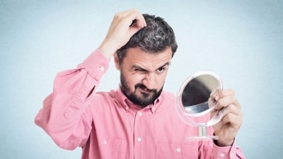 White hair causes and treatment: Expert shares insights (Unsplash) White hair causes and treatment: Expert shares insights (Unsplash)