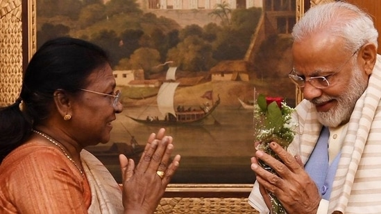 BJP's Presidential candidate Droupadi Murmu with PM Narendra Modi. (Twitter@droupadi_murmu)