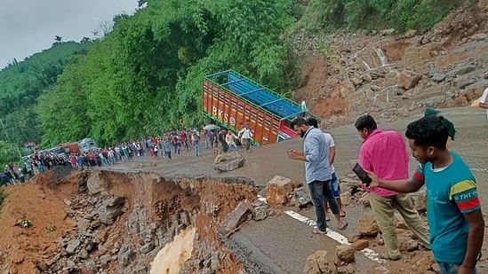 The National Highway 6 caved in due to a landslide after heavy rains in Meghalaya's East Jaintia Hills district, cutting off Tripura from the rest of the country. (HT_PRINT)