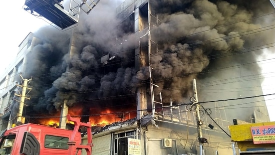 Flames and smoke from a fire in a building near Mundka metro station, in New Delhi.&nbsp;(ANI file)