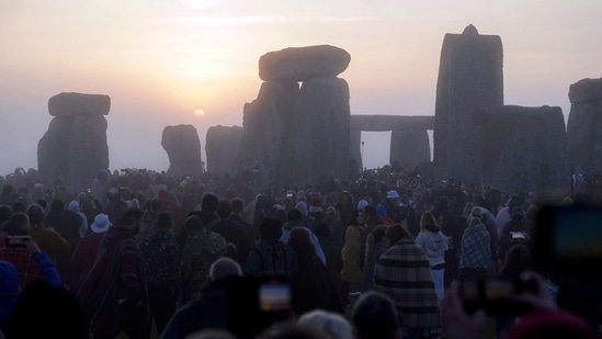 English Heritage, which looks after Stonehenge among around 400 historic sites, said 170,000 people around the world also watched the solstice online on June 21.(AP)