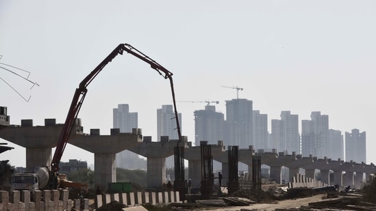 A view of the high rise buildings in the backdrop of under construction flyover on Dwarka Expressway in Gurugram, India. (Photo by Vipin Kumar / Hindustan Times)(Vipin Kumar /HT PHOTO)