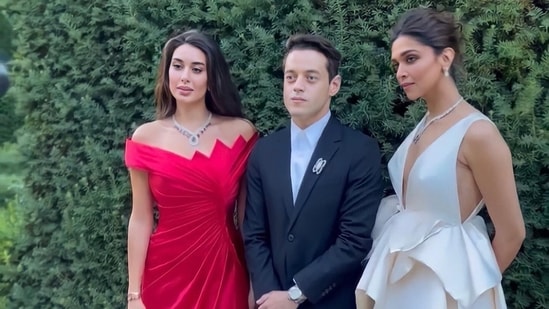 Deepika Padukone poses with Rami Malek and Yasmine Sabri.
