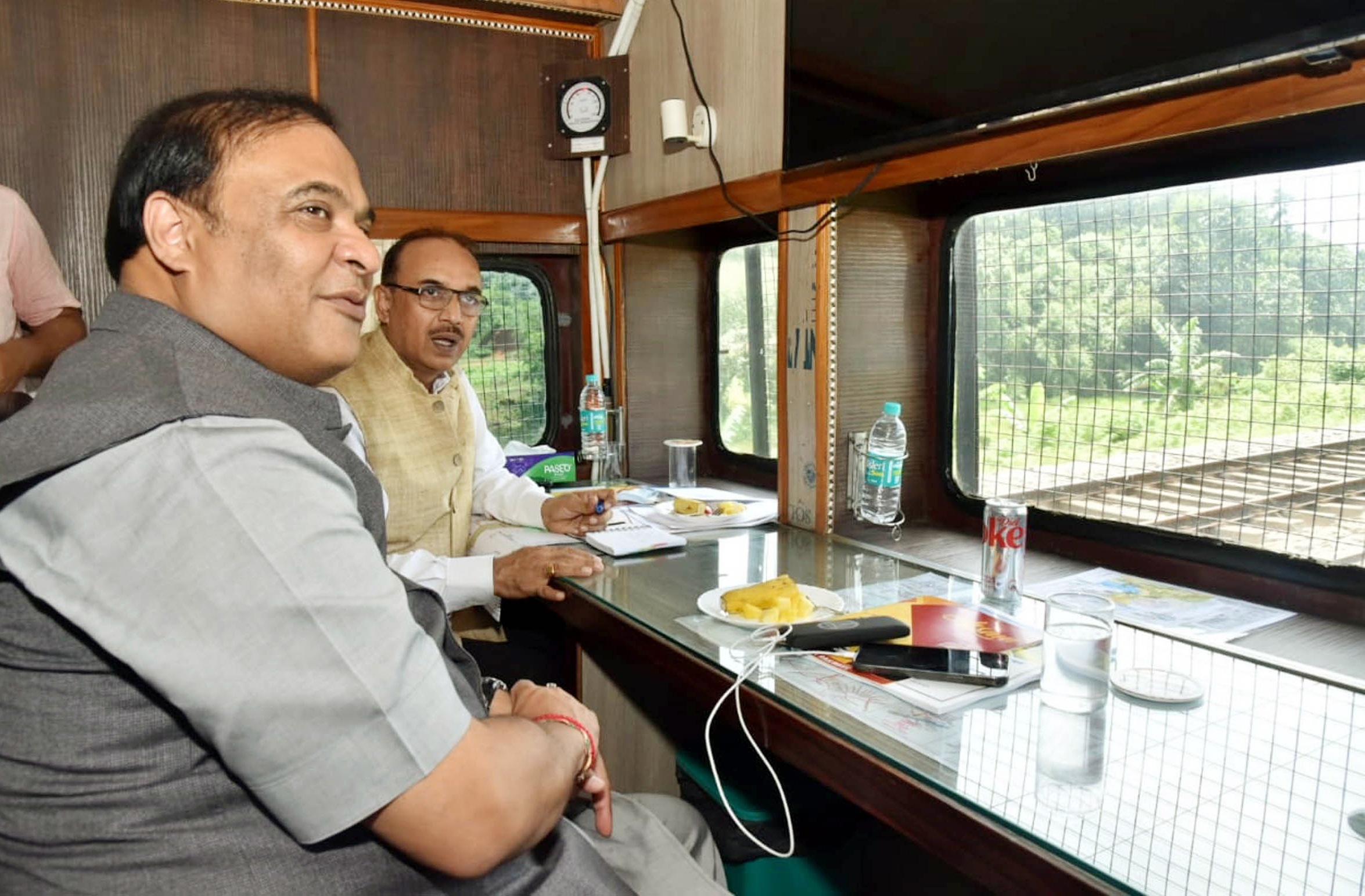 Assam Chief Minister Himanta Biswa Sarma undertakes a train journey from Guwahati to flood-affected areas in Nagaon on Wednesday. ( ANI) Assam Chief Minister Himanta Biswa Sarma undertakes a train journey from Guwahati to flood-affected areas in Nagaon on Wednesday. ( ANI)