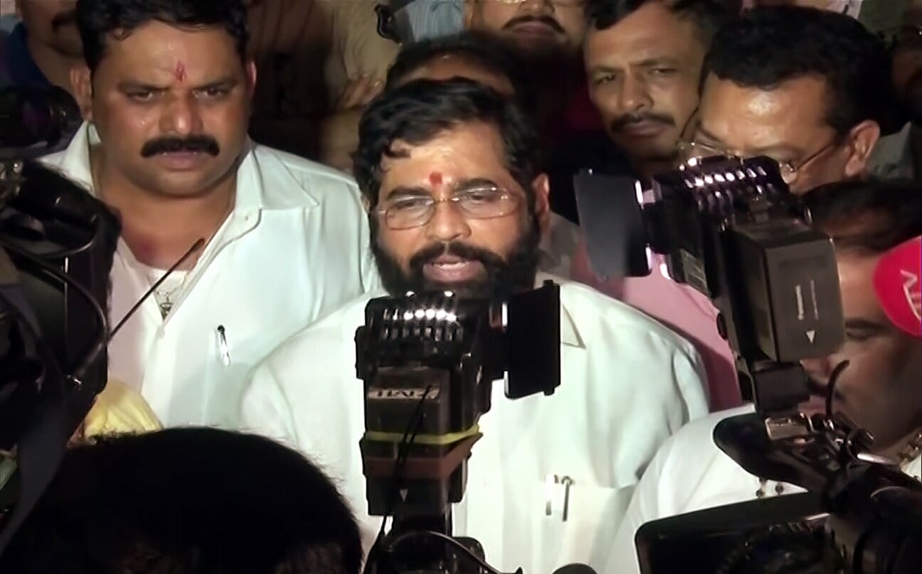 Shiv Sena leader and rebel Maharashtra minister Eknath Shinde speaks to the media, in Surat, Gujarat, on Wednesday, June 22, 2022. (ANI Photo) Shiv Sena leader and rebel Maharashtra minister Eknath Shinde speaks to the media, in Surat, Gujarat, on Wednesday, June 22, 2022. (ANI Photo)