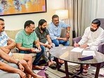 Rebel Shiv Sena leader Eknath Shinde with other MLAs during a meeting, in Guwahati on Wednesday. (PTI)(HT_PRINT)