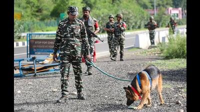 Central Reserve Police Force jawans keep a watch on the Jammu-Srinagar National Highway ahead of the start of annual Amarnath Yatra, near Jammu, on Thursday. (PTI) Central Reserve Police Force jawans keep a watch on the Jammu-Srinagar National Highway ahead of the start of annual Amarnath Yatra, near Jammu, on Thursday. (PTI)