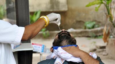 A health worker collects a swab samples from a man for a Covid-19 test in Patna. (Santosh Kumar/HT) A health worker collects a swab samples from a man for a Covid-19 test in Patna. (Santosh Kumar/HT)