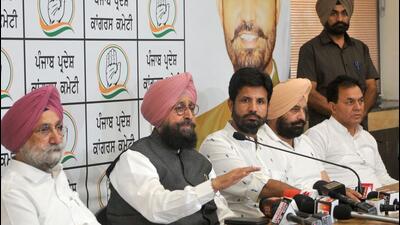 Senior Congress leader Partap Singh Bajwa along with Punjab Congress president Amarinder Singh Raja Warring during a press conference in Chandigarh, on Thursday. (Ravi Kumar/HT) Senior Congress leader Partap Singh Bajwa along with Punjab Congress president Amarinder Singh Raja Warring during a press conference in Chandigarh, on Thursday. (Ravi Kumar/HT)