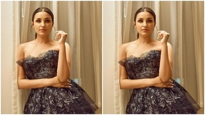 Parineeti minimally accessorised her look for the day in sleek golden earrings and a ring. (Instagram/@parineetichopra)