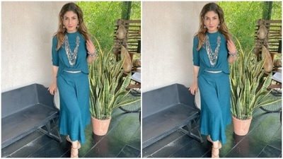 Raveena wore her coloured tresses open wavy curls with a middle part as she posed for the outdoor photoshoot. (Instagram/@officialraveenatandon)
