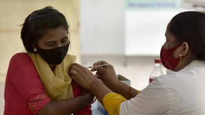 A woman being vaccinated against Covid-19 at the district hospital in Noida. (Sunil Ghosh/ HT) A woman being vaccinated against Covid-19 at the district hospital in Noida. (Sunil Ghosh/ HT)