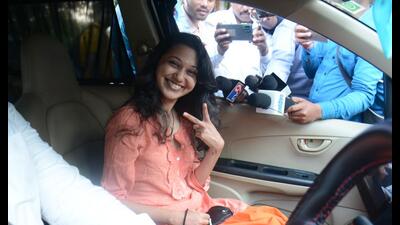 Marathi actor Ketaki Chitale is all smiles as she waves from her car following her release from the Thane Central Jail on Thursday. (PRAFUL GANGURDE/HT PHOTO) Marathi actor Ketaki Chitale is all smiles as she waves from her car following her release from the Thane Central Jail on Thursday. (PRAFUL GANGURDE/HT PHOTO)