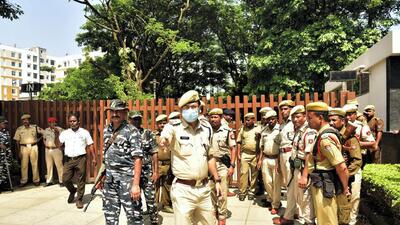Security personnel outside the hotel where rebel Shiv Sena MLAs are staying in Guwahati. (PTI) Security personnel outside the hotel where rebel Shiv Sena MLAs are staying in Guwahati. (PTI)