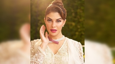 Jacqueline Fernandez's outfit comes with a blouse, high-rise flared pants and a flowy cape jacket. (Instagram/@jacquelinef123) Jacqueline Fernandez's outfit comes with a blouse, high-rise flared pants and a flowy cape jacket. (Instagram/@jacquelinef123)