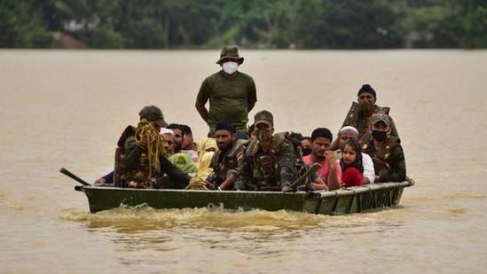 FILE PHOTO: Indian Army soldiers evacuate people from flooded area to a safer place after heavy rains at a village in Hojai district, in the northeastern state of Assam, India, June 18, 2022. REUTERS/Anuwar Hazarika (REUTERS)