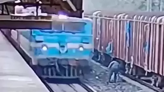 Watch | Railway staff rushes to save man from getting crushed under ...