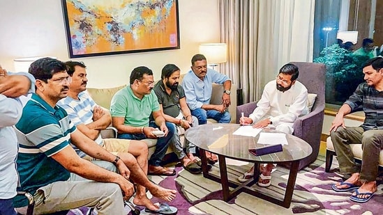 Rebel Shiv Sena leader Eknath Shinde with other MLAs during a meeting, in Guwahati on Wednesday, June 22, 2022. (PTI)