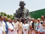 Before filing nominations, Droupadi Murmu pays tribute to Mahatma Gandhi at Parliament House. (PTI)
