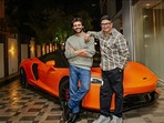 Kartik Aaryan and Bhushan Kumar posing with his new McLaren GT. Kartik Aaryan and Bhushan Kumar posing with his new McLaren GT.