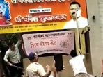 A hoarding with the picture of Shiv Sena MLA Mangesh Kudalkar being destroyed in Kurla, Mumbai. (Sourced by HT) A hoarding with the picture of Shiv Sena MLA Mangesh Kudalkar being destroyed in Kurla, Mumbai. (Sourced by HT)