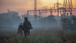 Ukrainian service members patrol an area in the city of Sievierodonetsk.