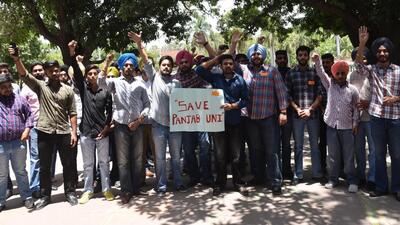 Student Organisation of India members holding a protest at the Students’ Centre at Panjab University, Chandigarh, on Friday. (Keshav Singh/HT)