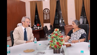 French Ambassador Emmanuel Lenain speaking with AU VC Prof Sangita Srivastava at AU on Friday. (HT PHOTO)
