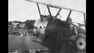 With a Sopwith Camel in 1917. Hardit Singh Malik is holding the oversized flying helmet to put over the turban when flying. (Image courtesy Santhya Malik) With a Sopwith Camel in 1917. Hardit Singh Malik is holding the oversized flying helmet to put over the turban when flying. (Image courtesy Santhya Malik)