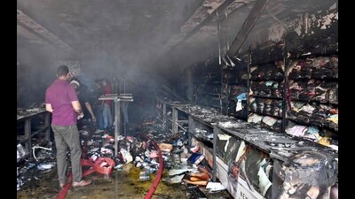 The burnt articles at the garment store on Chaar Khamba Road in Model Town, Ludhiana, where the fire broke out on Friday. (Gurpreet Singh/HT) The burnt articles at the garment store on Chaar Khamba Road in Model Town, Ludhiana, where the fire broke out on Friday. (Gurpreet Singh/HT)