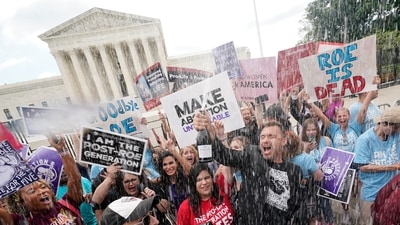 A celebration outside the Supreme Court, Friday, June 24, 2022, in Washington. (AP) A celebration outside the Supreme Court, Friday, June 24, 2022, in Washington. (AP)