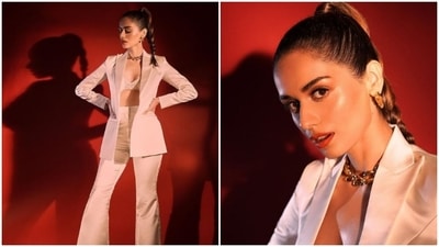 Manushi Chhillar nailed the chic look in a satin white pantsuit teamed with a bralette and gold accessories. (Instagram/@manushi_chhillar)