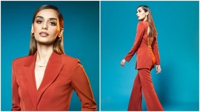 Manushi Chhillar sets some major fashion goals as she poses like a boss lady for a photoshoot in a red pantsuit. (Instagram/@manushi_chhillar)