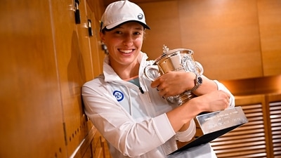 Iga Swiatek, of Poland, poses with the French Open (AP) Iga Swiatek, of Poland, poses with the French Open (AP)