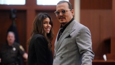 Johnny Depp and his attorney Camille Vasquez look on during his defamation case against ex-wife, actor Amber Heard at Fairfax County Circuit Court in Fairfax, Virginia, U.S., May 19, 2022. Shawn Thew/Pool via REUTERS (REUTERS)