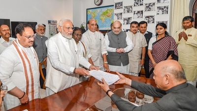 Droupadi Murmu files her nomination papers for the presidential election in the presence of Prime Minister Narendra Modi, Union Ministers Rajnath Singh, Amit Shah, Nitin Gadkari and BJP President J P Nadda, at Parliament House. (PTI) Droupadi Murmu files her nomination papers for the presidential election in the presence of Prime Minister Narendra Modi, Union Ministers Rajnath Singh, Amit Shah, Nitin Gadkari and BJP President J P Nadda, at Parliament House. (PTI)