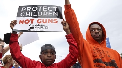 Demonstrators attend a rally against gun violence. (AFP file image) Demonstrators attend a rally against gun violence. (AFP file image)