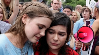 Anti-abortion demonstrators celebrate outside the US Supreme Court as the court rules in the Dobbs v Women’s Health Organization abortion case. (Reuters)
