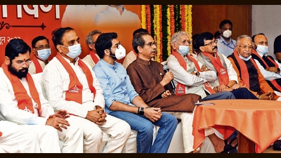 Eknath Shinde (left) with Shiv Sena leader Aaditya Thackeray and CM Uddhav Thackeray at an event to mark the party’s Foundation Day in Mumbai on June 19. (Hindustan Times) Eknath Shinde (left) with Shiv Sena leader Aaditya Thackeray and CM Uddhav Thackeray at an event to mark the party’s Foundation Day in Mumbai on June 19. (Hindustan Times)
