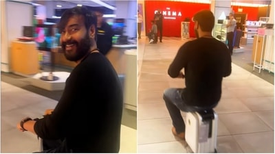 Ajay Devgn shared a video of him riding a suitcase scooter.