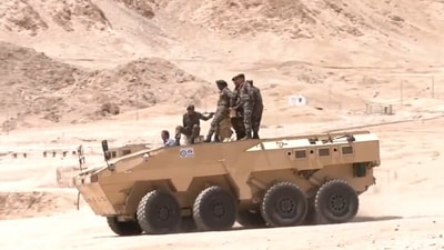 Northern Army Commander Lt General Upendra Dwivedi drives the Made in India Infantry Combat Vehicle in Leh. (ANI)