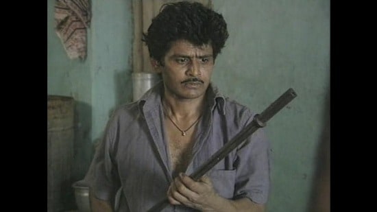 Raghuvir Yadav in Raman Raghav, A City, A Killer (1991) (Film still) Raghuvir Yadav in Raman Raghav, A City, A Killer (1991) (Film still)