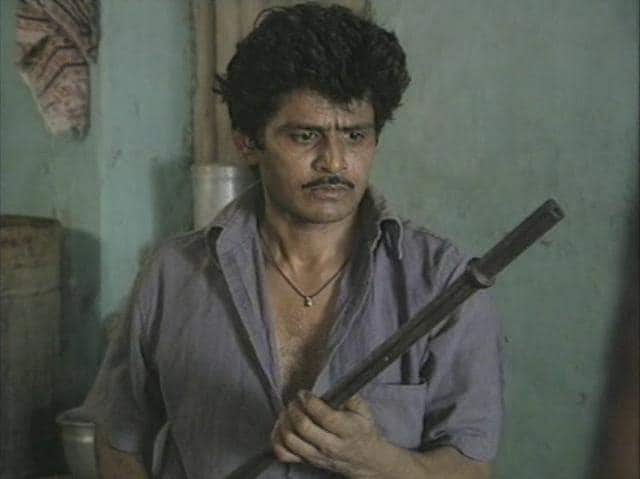 Raghuvir Yadav in Raman Raghav, A City, A Killer (1991) (Film still) Raghuvir Yadav in Raman Raghav, A City, A Killer (1991) (Film still)