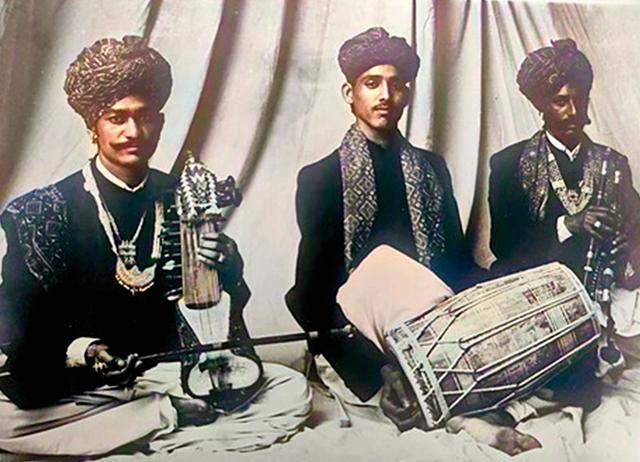 Mame Khan (centre) playing the dholak in his 20s Mame Khan (centre) playing the dholak in his 20s